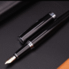 ab9711a7-6b42-46a4-a7b1-a48fd1296209 Black and gold iridium men's fountain pen-Gift Box Set